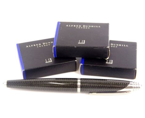 An Alfred Dunhill black carbon fibre torpedo shaped fountain pen, with brushed mounts, signed to the band, Alfred Dunhill and