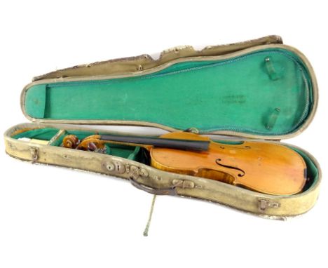 A late 19th/ early 20th violin, with a two piece back, label for Stradivarius, length of back 35.5cm (AF).