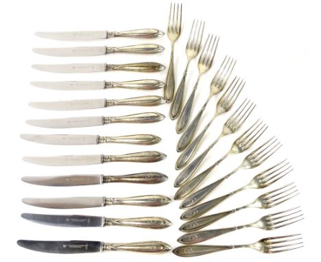 A set of twelve early 20thC German while metal table forks, each with a tapering handle and engraved initial B. Stamped 800, 