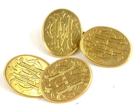 A pair of oval cufflinks, bearing the inscription HMW to each side, yellow metal, unmarked, marked C&amp;K, 8.9g all in. 