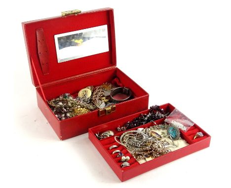 A faux red leather jewellery box and contents, comprising amethyst style necklace, silver and other dress rings, snake brooch