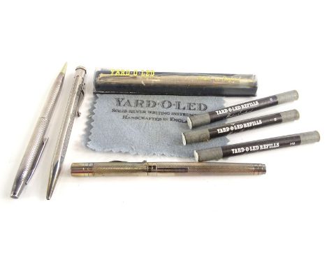 A silver Yard-O-Led fountain pen, a Yard-O-Led propelling pencil and another similar silver propelling pencil, etc.