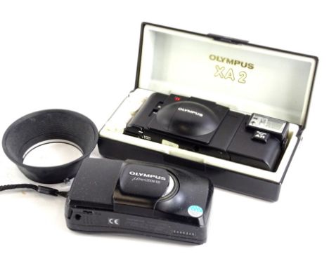 An Olympus MJU Zoom 105 camera, a further Olympus A11 XA2 camera, 13cm wide, in fitted case (2).