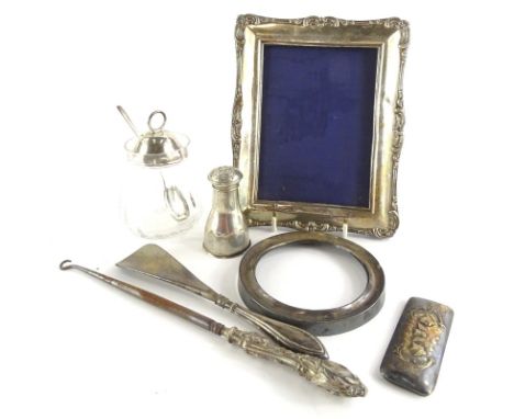 Various silver and silver mounted items etc., to include frames, button hooks, shoe horn, pepper pot, etc.