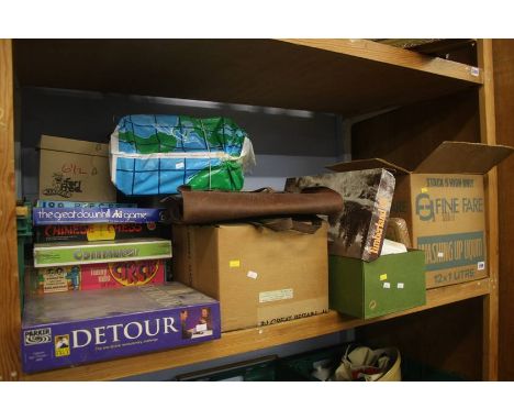 Shelf of board games, children's books etc.