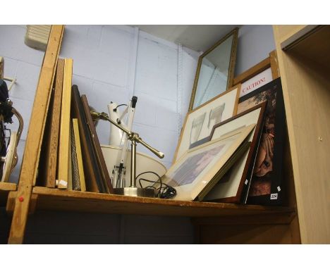 Shelf of prints, lamps, oval mirror etc.