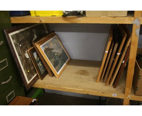 Shelf of railway prints
