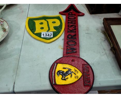 Cast iron Ferrari Workshop sign and BP Garage sign. UK P&amp;P Group 2 (£20+VAT for the first lot and £4+VAT for subsequent l