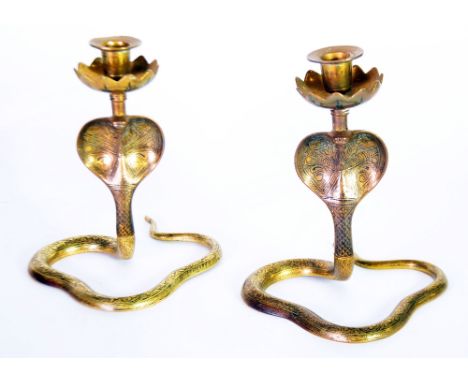 PAIR EARLY 20th CENTURY BRASS AND BLACK ENAMEL DETAILED REARING COBRA CANDLESTICKS, four piece screw together construction, 8