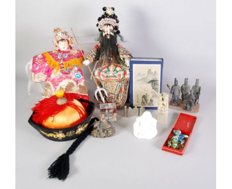 A selection of Modern Chinese souvenir items including seven gilt metal and enamel articulated carp, a tiny carved jade carve