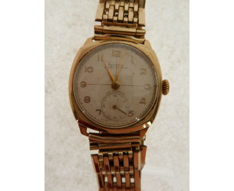 A 1950's 9ct GOLD CASED ROTARY SUPER-SPORTS GENTLEMAN'S WRIST WATCH, on a gold plated gate-link bracelet 