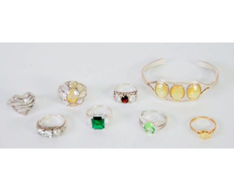 WELO OPAL RING, claw set round cut opal to plain gold band, stamped 375, size N, 1.4g, A GEM SET SILVER TORQUE BANGLE, AND SI