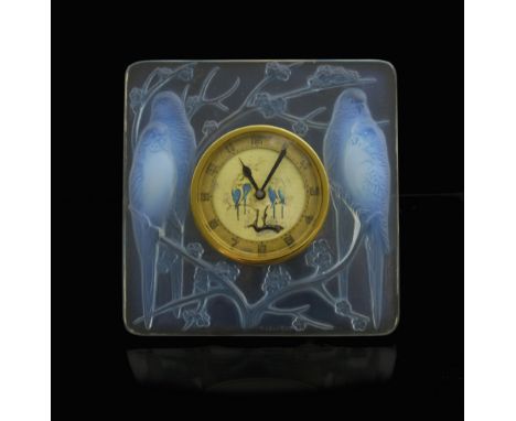Rene Lalique, an Inseperables opalescent glass clock, model 765, designed circa 1926, blue stained, polished and frosted, the