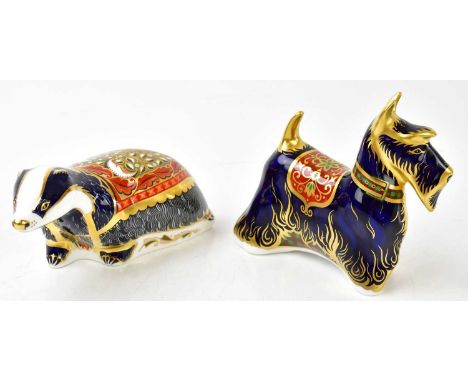 ROYAL CROWN DERBY; two paperweights, 'Moonlight Badger' and 'Scottish Terrier'.Condition Report: Each with gold base button a