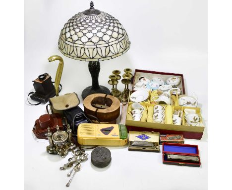 An assortment of collectors' items to include two pairs of brass candlesticks, a small quantity of cameras, silver plated oil