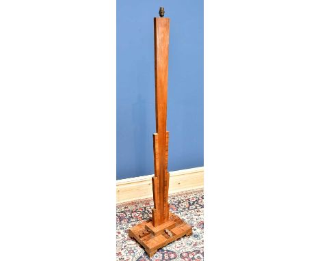 An Art Deco walnut standard lamp of angular form on rectangular plinth base, height excluding fitting 105cm.