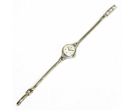 ROTARY; a lady's 9ct white gold vintage wristwatch with Arabic and baton markers, length 13cm, approx. 11.5g.