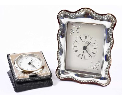 RICHARD CARR; an Elizabeth II hallmarked silver clock, Sheffield 1996, together with a further travelling alarm clock, Sheffi