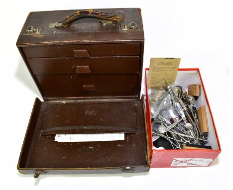 A vintage leather doctor's bag and quantity of equipment.
