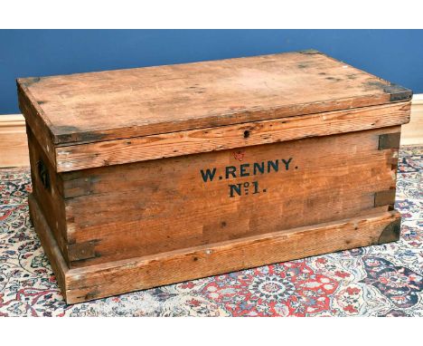A large metal bound old pine trunk, on iron handles, on plinth base, width 110cm, depth 62cm, height 50cm.