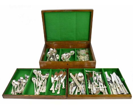 An oak case silver plated canteen of cutlery and flatware.