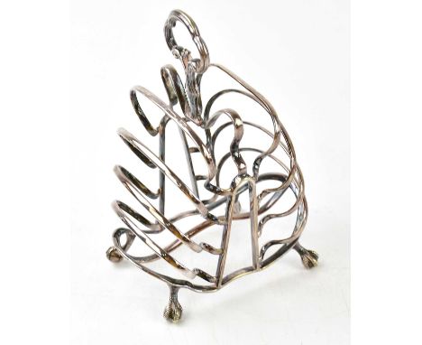 An unusual white metal toast rack of stepped design, indistinctly stamped 'R&amp;H No.2682'? and further obscured marks, heig