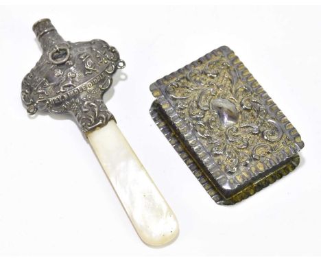 An Edward VII hallmarked silver mother of pearl children's teething rattle, embossed 'Hey Diddle, Diddle' with cast decoratio