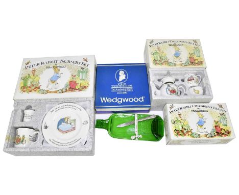 WEDGWOOD; two Peter Rabbit children's tea services and a Peter Rabbit nursery set, also a cased set of two Wedgwood plates pr