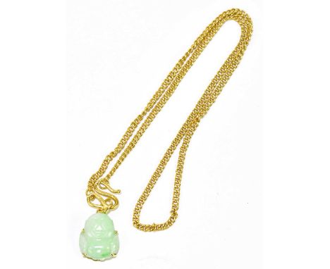 A Chinese carved jade buddha pendant suspended on a flat link yellow metal chain, combined approx. 16.8g, unmarked.Condition 