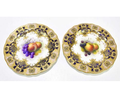 A SHUCK FOR ROYAL WORCESTER; a pair of cabinet plates decorated with fruit, diameter 22cm.Condition Report: Light scratches a