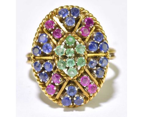 An 18ct yellow gold emerald, ruby, and sapphire set domed oval cluster ring with pierced basket setting, size L, approx. 7.8g