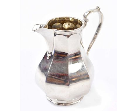 GEORGE HOWSON; a George VI hallmarked silver milk/cream jug, Sheffield 1939, approx weight 5.21ozt/162.1g.