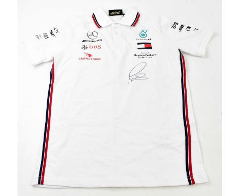 LEWIS HAMILTON; a Petronas AMG Mercedes signed shirt, signed to the front, size XS.Condition Report: Creasing and light gener