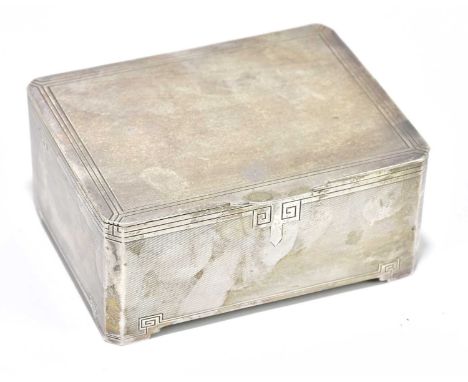 A George V hallmarked silver Art Deco wooden lined rectangular trinket box with engraved detail and engine turned decoration,