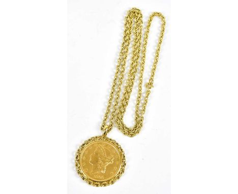 A 1900 twenty dollar United States coin, now mounted as a pendant in 18ct mount and on 18ct rope twist trace link chain, leng