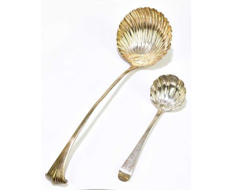 A Georgian silver soup ladle with shell shaped bowl, (marks rubbed), length 31cm, together with a sterling silver sauce ladle