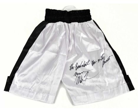 MIKE TYSON; a pair of signed shorts, signed and inscribed to reverse, 'The baddest man on the planet'.Condition Report: Creas