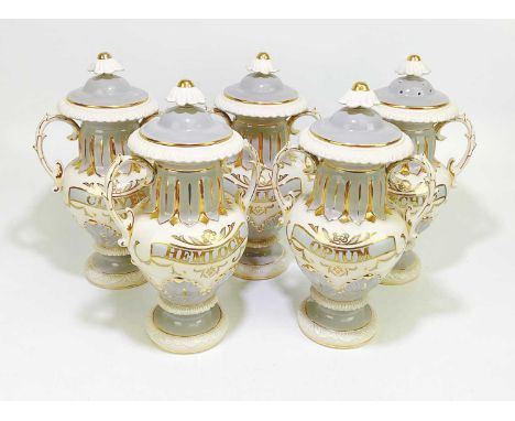 BLAKENEY; five reproduction ceramic twin handled apothecary jars and covers, decorated in gilt, 'dills', 'leeches', 'opium', 