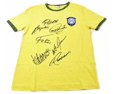 BRAZIL; a 1970 replica winning team shirt, signed to the front by Pele, Carlos Alberto, Jairzinho, Piazza, Brito, Felix and R