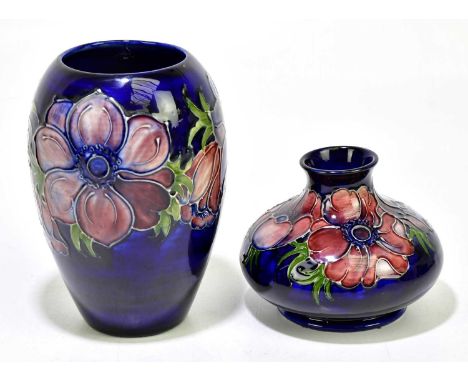 MOORCROFT; two vases decorated in 'Anemone' pattern on a blue ground to include an ovoid example, height 17cm.Condition Repor