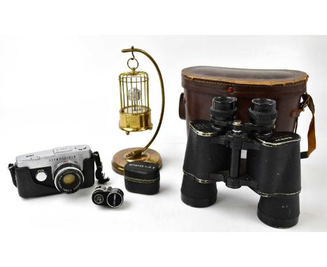 SANKYO; 7 x 50 field binoculars in brown leather case, together with an Olympus PenF camera, and a novelty bird cage clock.