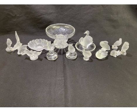 LALIQUE; a collection of thirteen pieces of clear and frosted glassware to include a footed bowl relief moulded with birds to