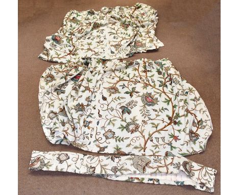 A pair of crewelwork curtains, with floral decoration in shades of brown, green, salmon pink, blue and red, length 240cm, wid