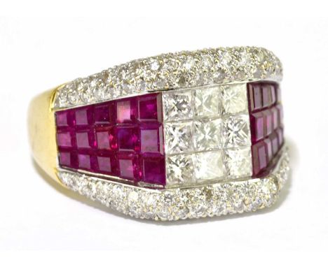 An 18ct yellow gold invisible set diamond and ruby ring in the Art Deco style, size M, approx weight 7.9g.Condition Report: M