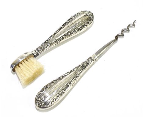 HENRY MATTHEWS; a George V hallmarked silver mounted moustache brush and similar perfume bottle corkscrew with hallmarked sil