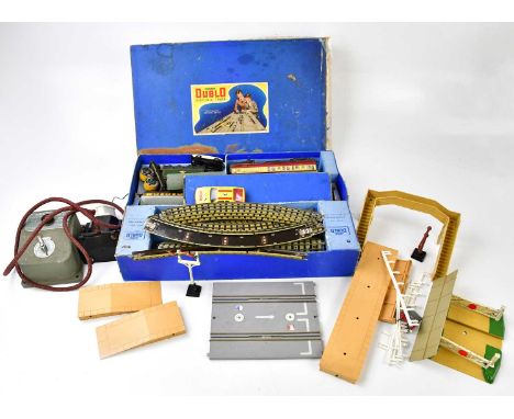 HORNBY; a Dublo electric train set, together with an assortment of accessories and rolling stock.  Condition Report: Engine i