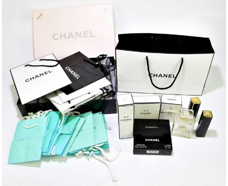 CHANEL; a set containing an unused Whisper Light lipstick, and a Le Vernis nail colour, eight empty Chanel No.5 perfume bottl