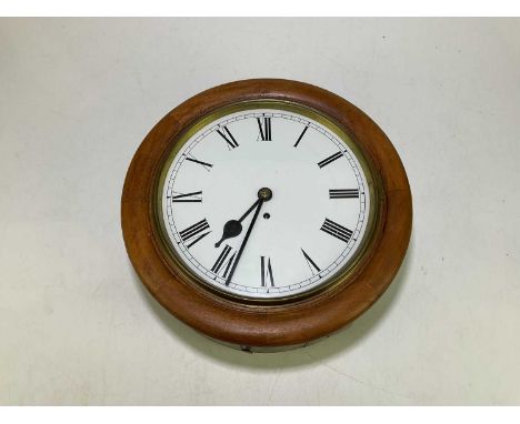 A late Victorian mahogany framed circular wall clock with single fusee movement and Roman numerals to the white painted dial,