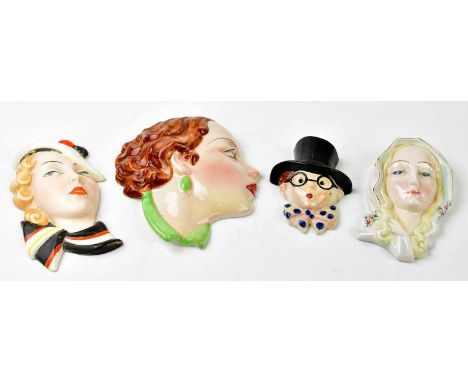 COPE &amp; CO; two Art Deco ceramic wall masks, to include a side profile of a girl with brown flowing hair, height 17cm, tog