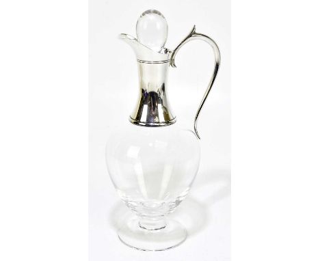 J.A. CAMBELL; an Elizabeth II hallmarked silver mounted and clear glass claret jug, mounts for London 2000, height 31cm.Condi
